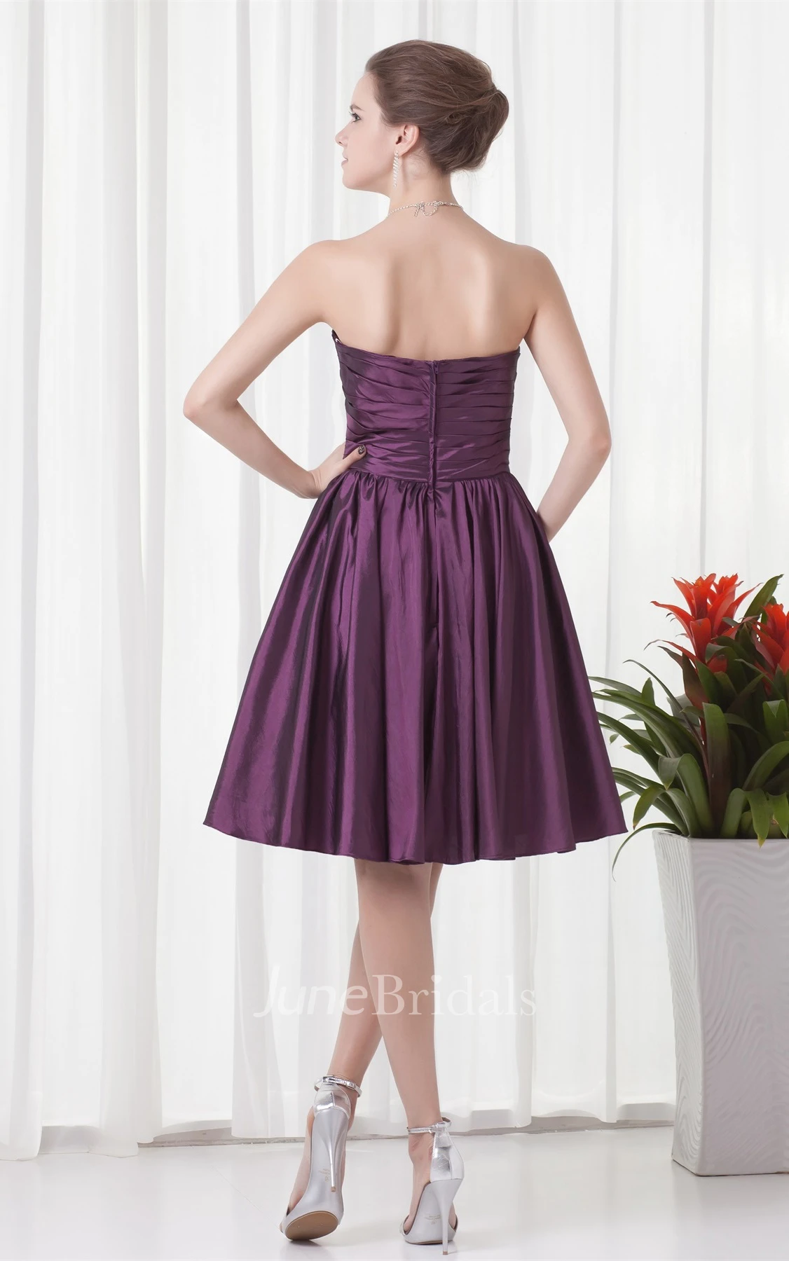 sweetheart knee-length criss-cross dress with pleats and flower
