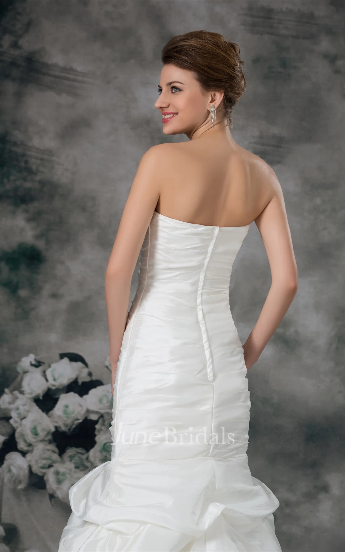 strapless a-line column gown with ruffled skirt and ruching