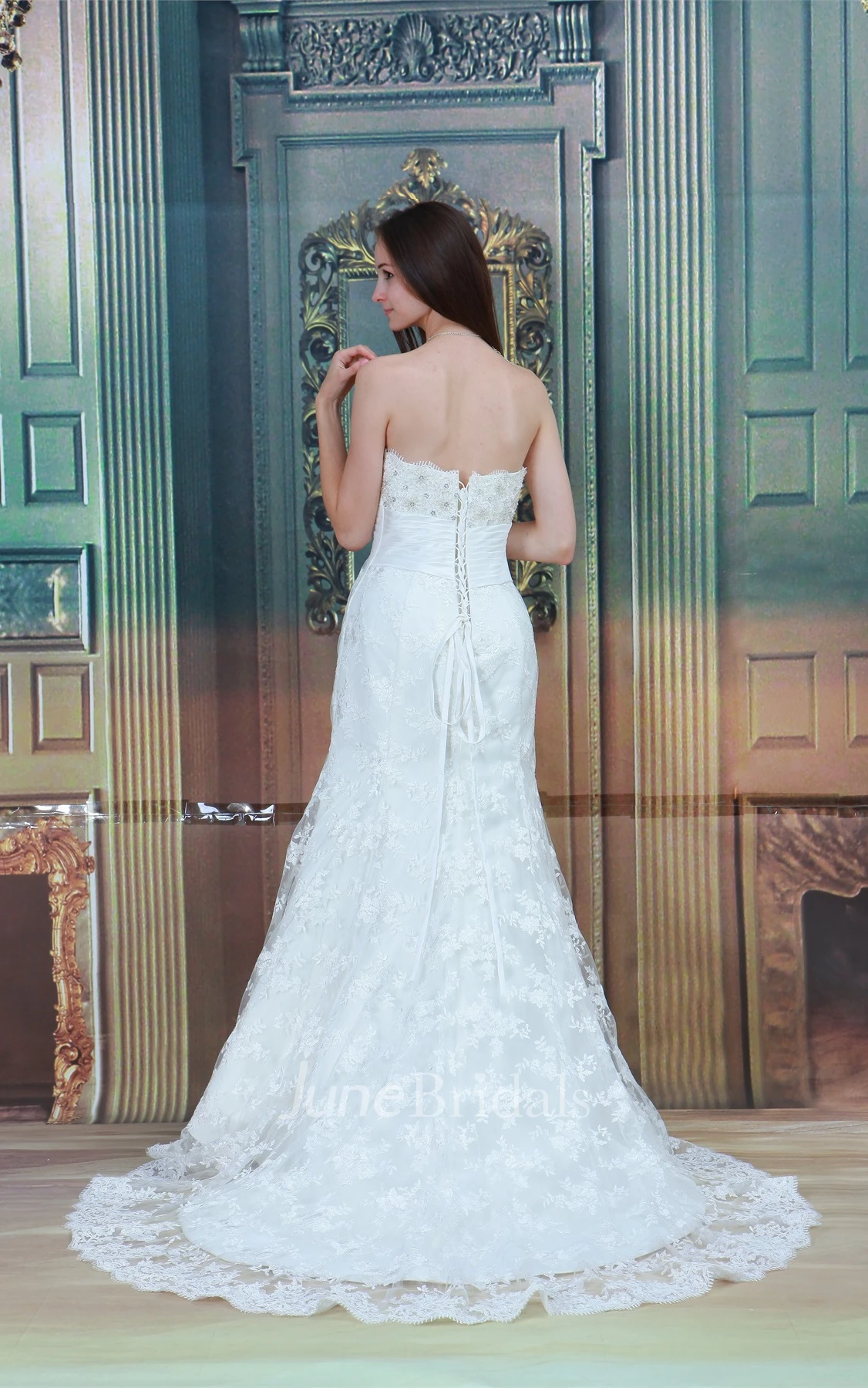 strapless a-line mermaid gown with bow and central ruching
