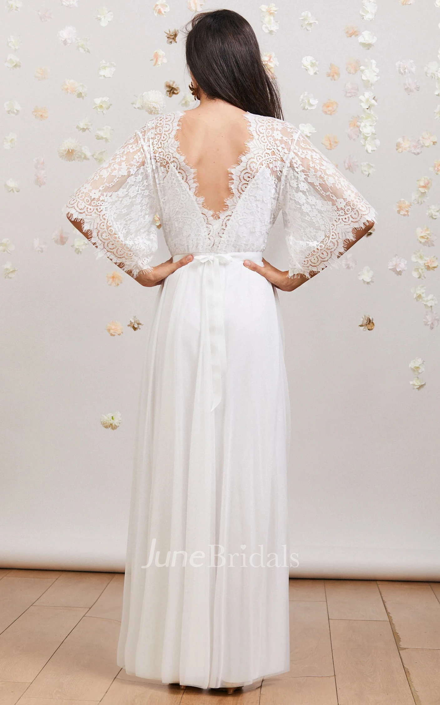 Elegant Romantic Bohemian Lace Spring Wedding Dress with Deep V Neck Open Back Flowy Bridal Gown