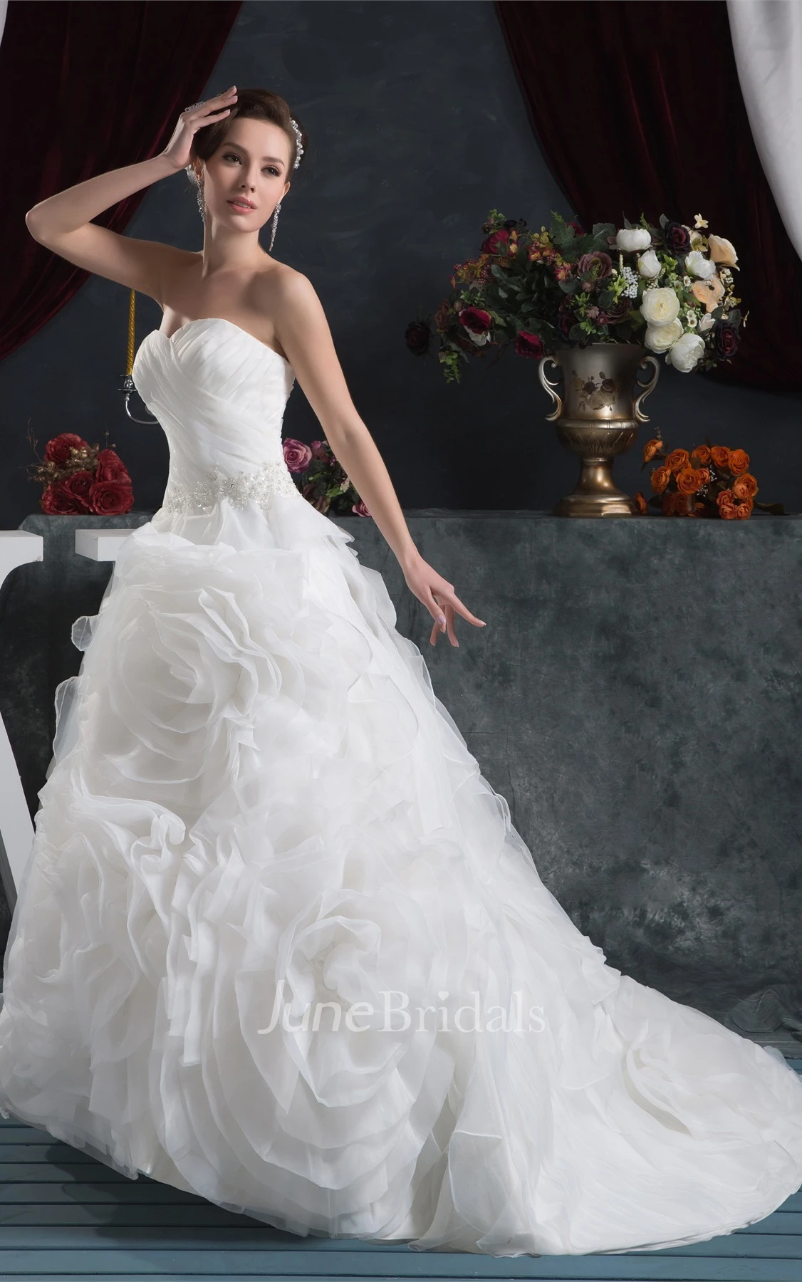 Sweetheart Criss-Cross Ball Gown with Ruffled Skirt and Stress