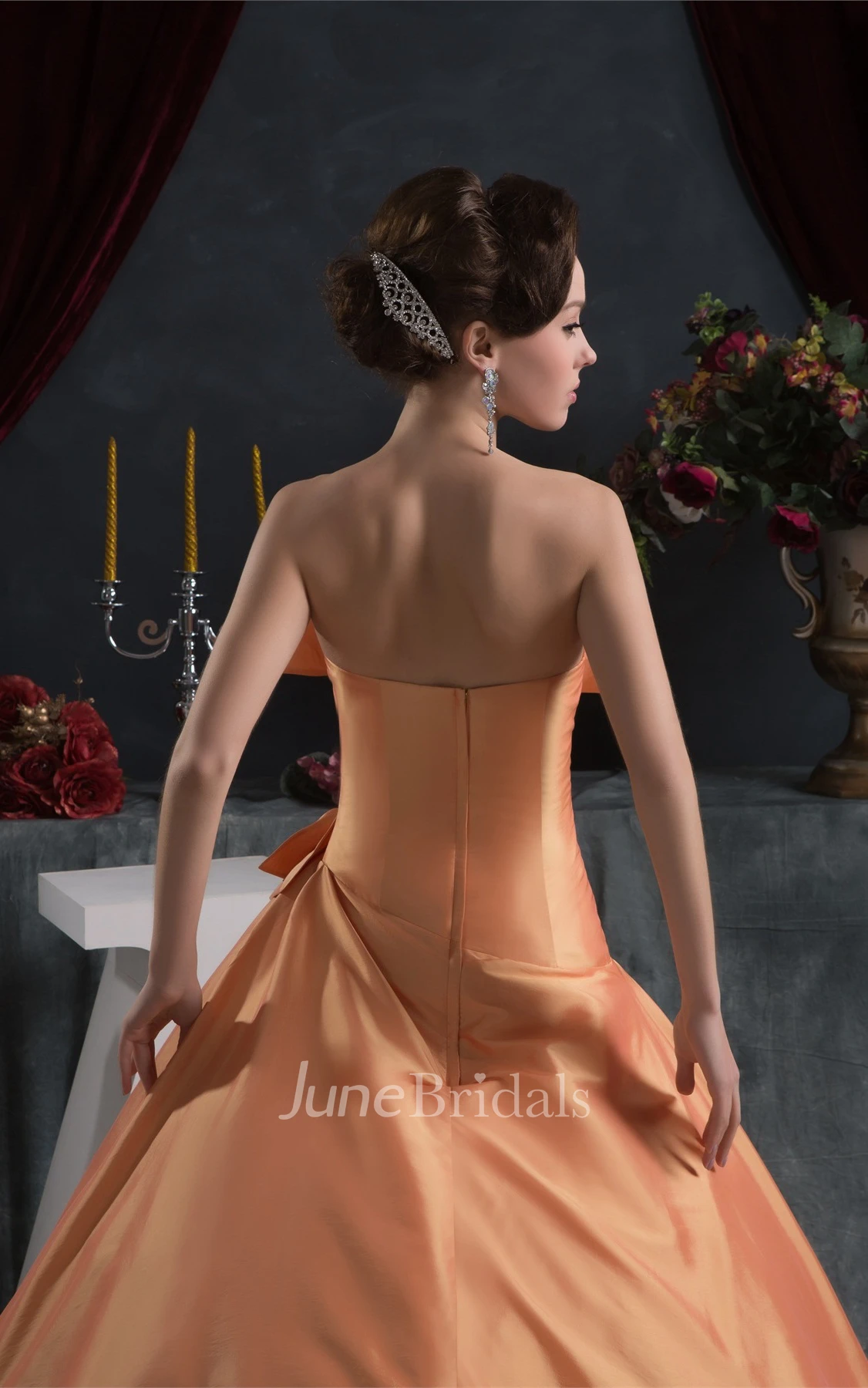 Strapless Ruffled Ball Gown with Flower and Pleats