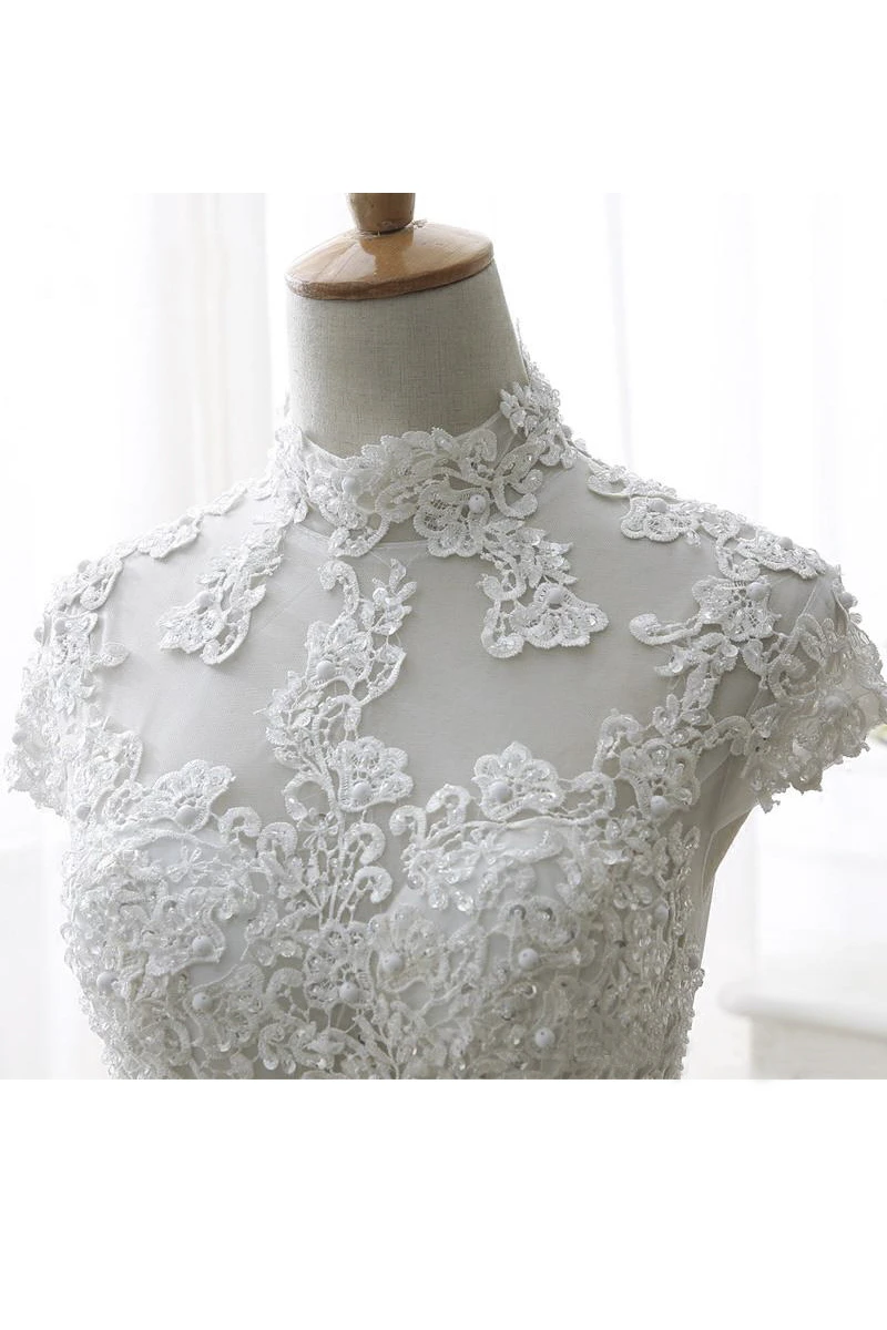 Appliqued Ball Gown Illusion Wedding Dress With High Neck And Beadings