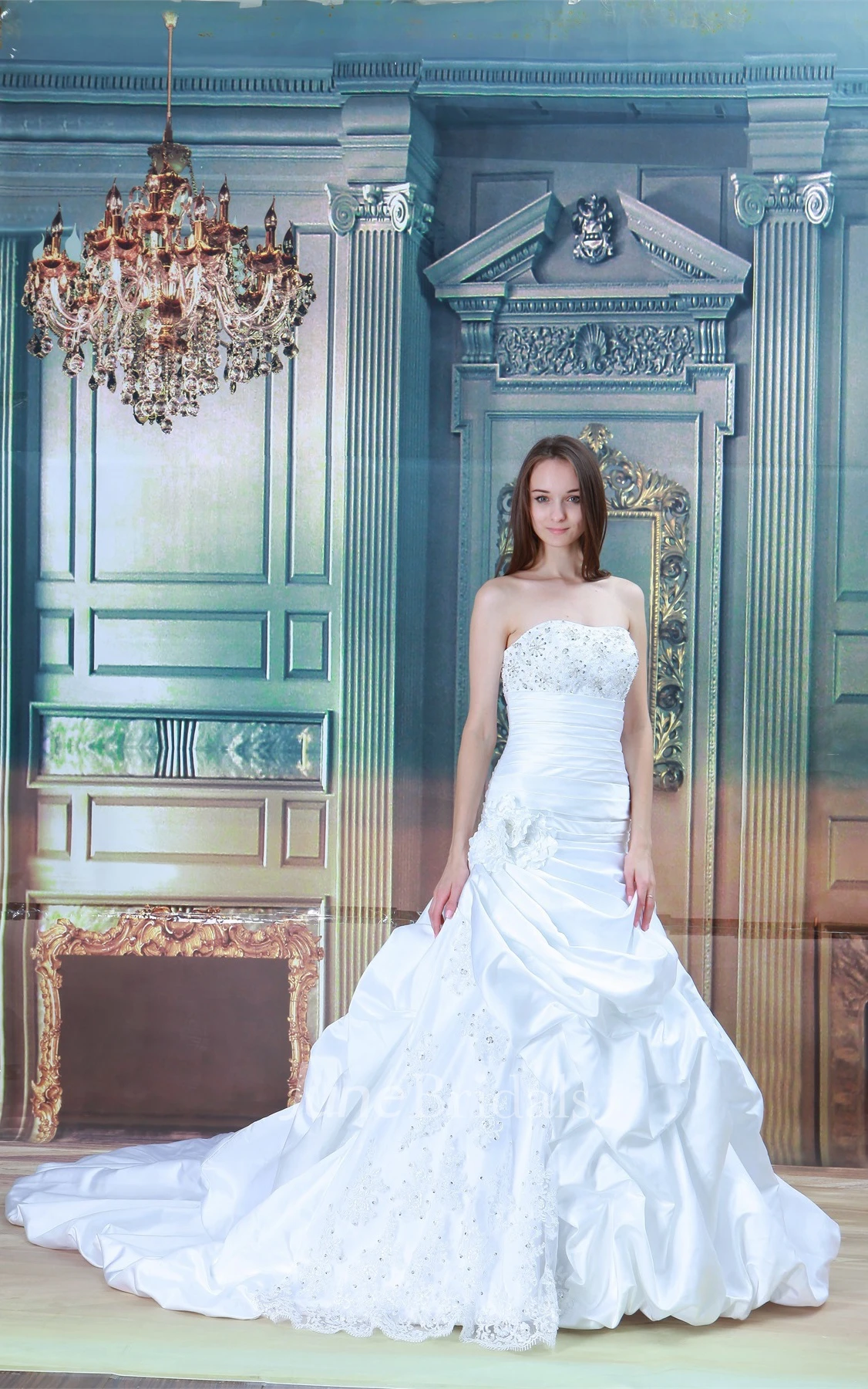 strapless a-line ball ruffled gown with appliques and beading