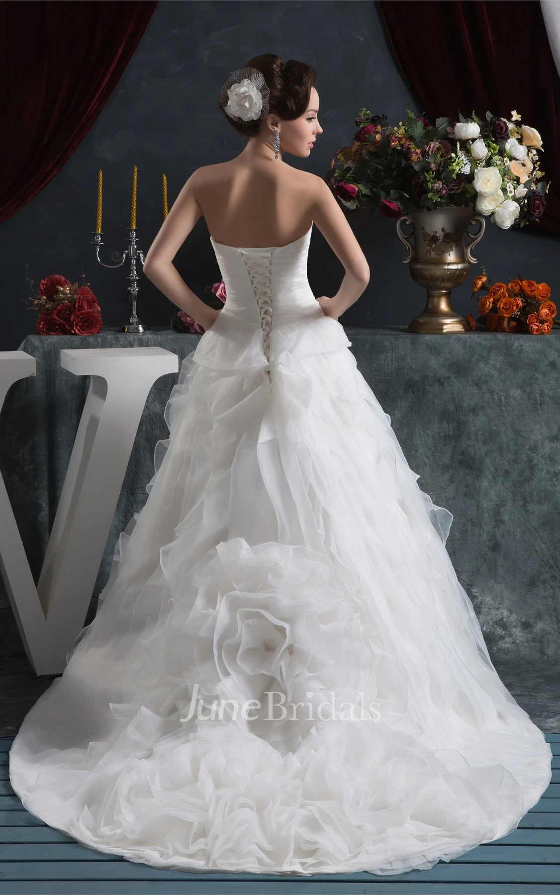 Sweetheart Criss-Cross Ball Gown with Ruffled Skirt and Stress