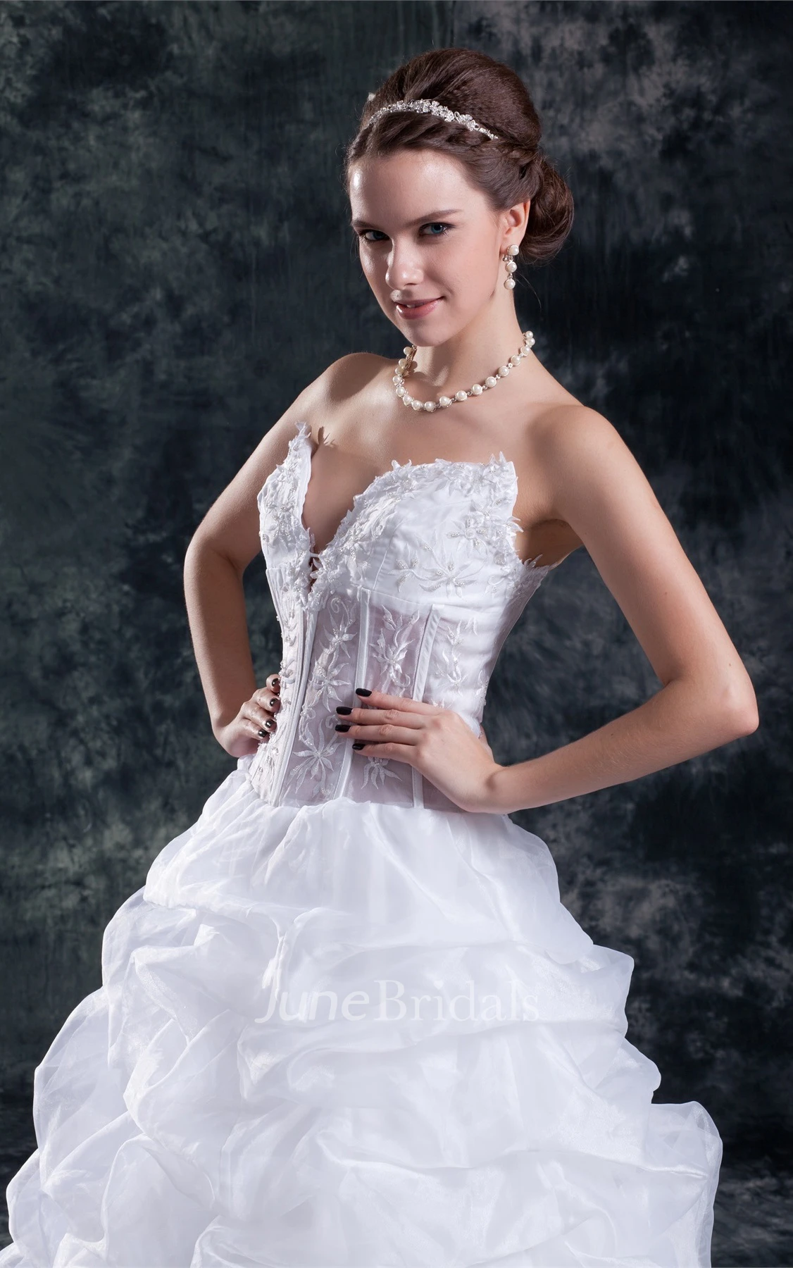 plunged ruffled ball strapless gown with embroideries