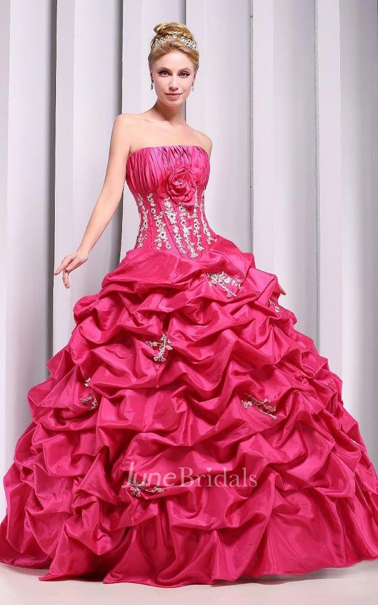 Strapless Ball Gown With Ruffles and Flower Detail