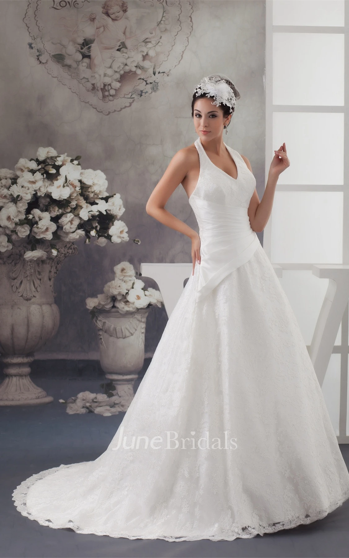 Sleeveless A-Line Appliqued Gown with Ruching and Halter