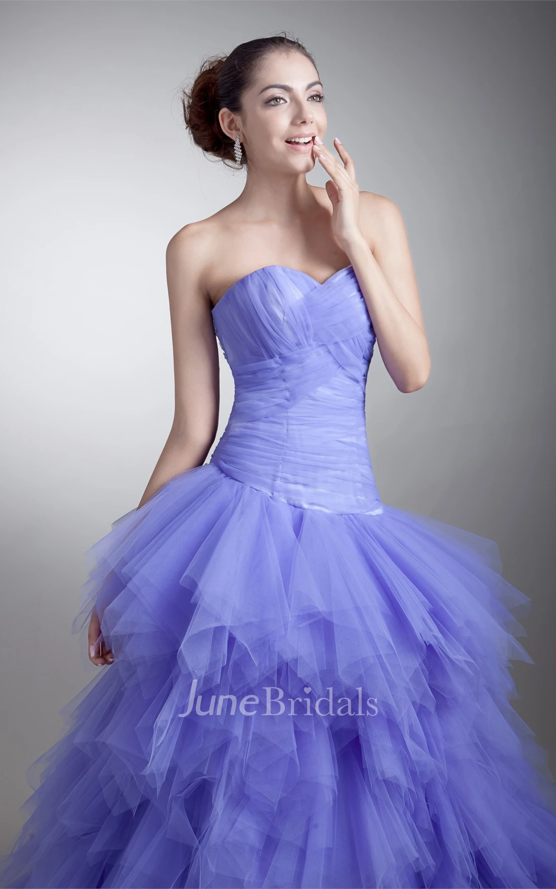 strapless tiered ball a-line criss-cross gown with ruffles