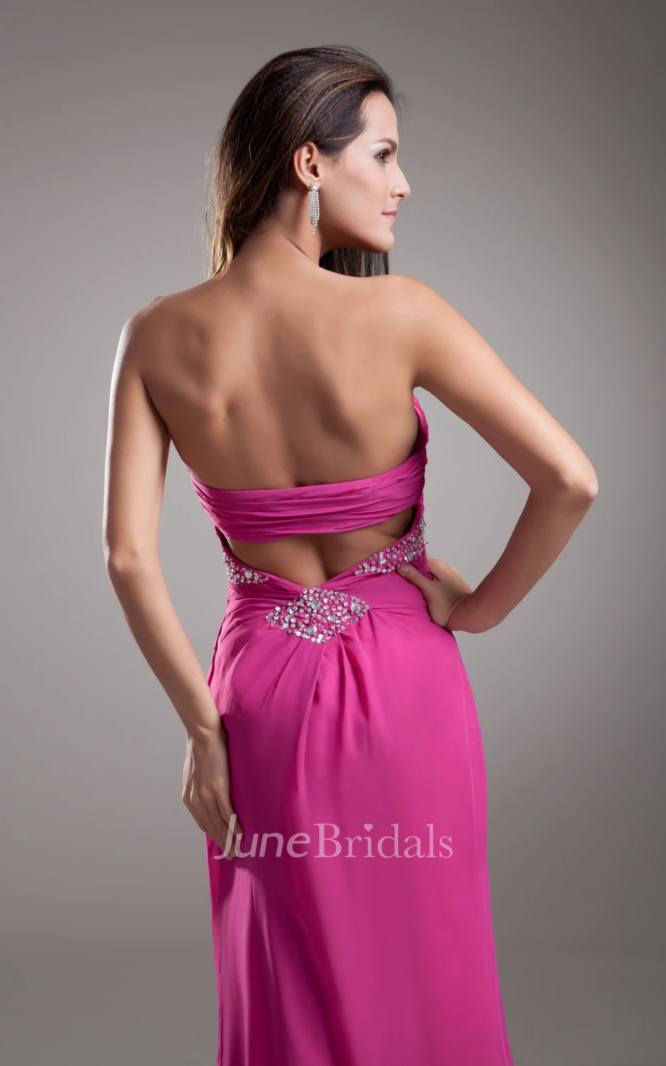 Soft Flowing Fabric Sweetheart Sleeveless Dress With Crystal Detailing And Draping