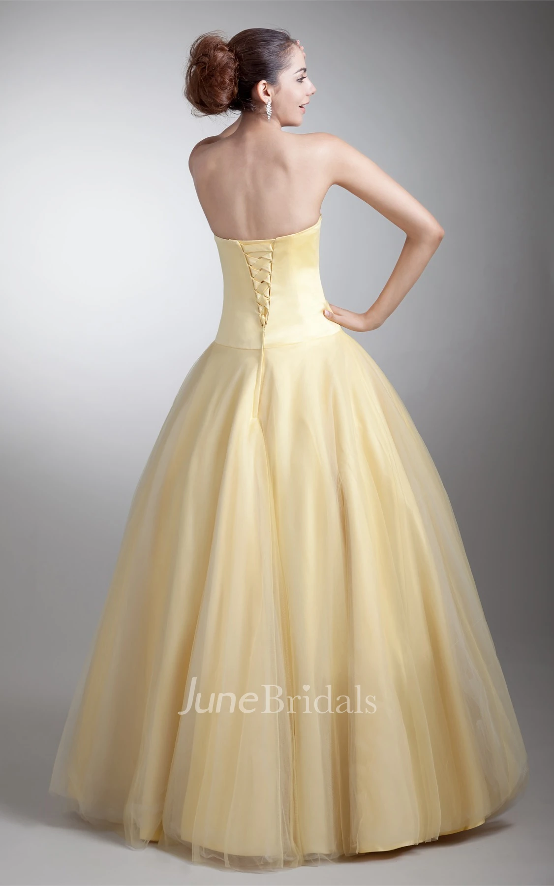sweetheart a-line ball tulle gown with ruched waist and corset back