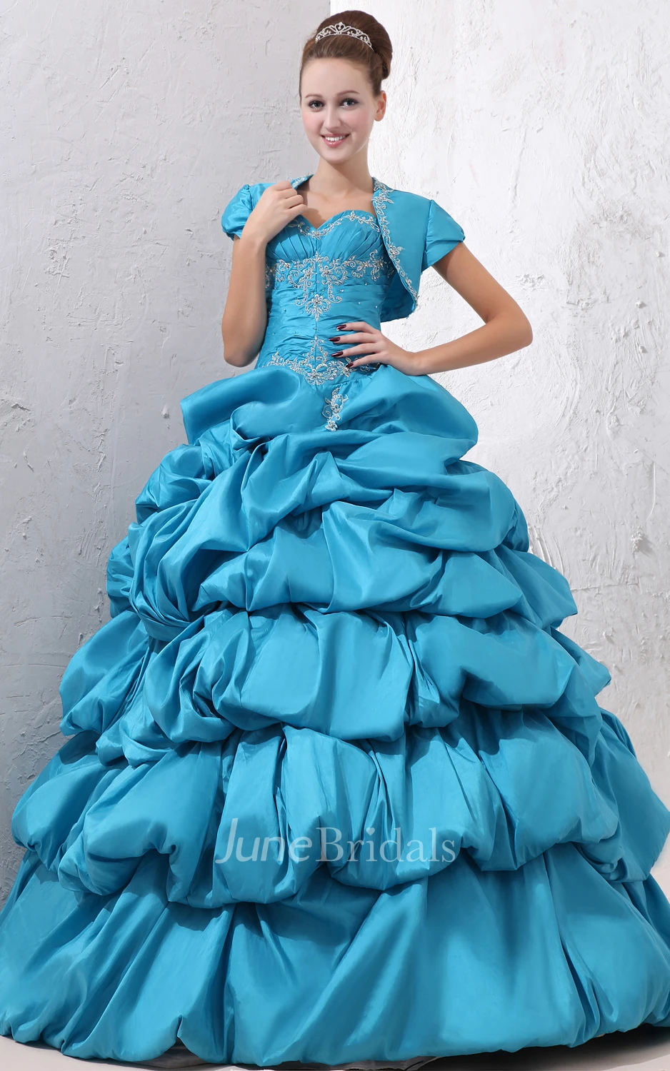 Sweetheart Sleeveless Princess Ball Gown With Crystal Detailing And Pick-Up Ruffles