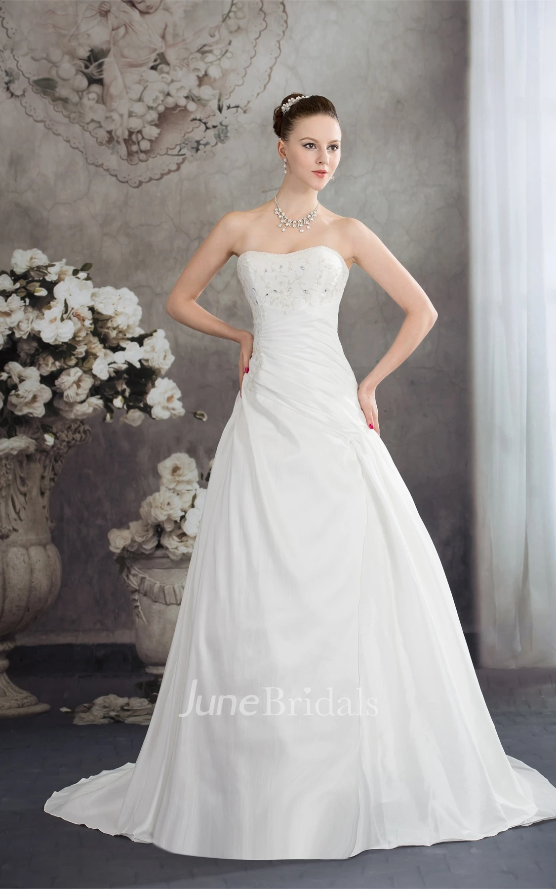 Strapless Appliqued Ball Gown with Beading and Ruching