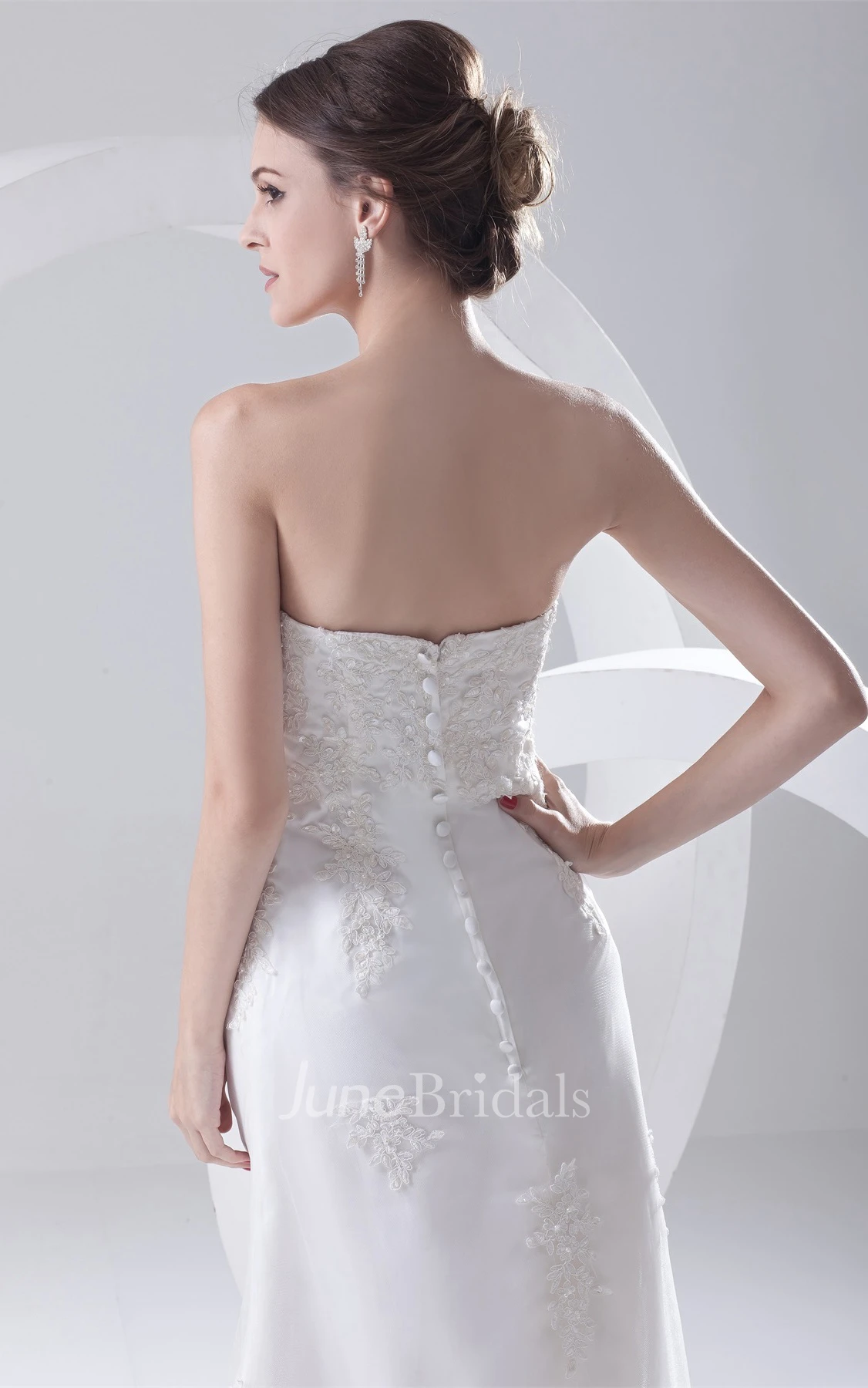 lace high-low strapless dress with crystal detailing