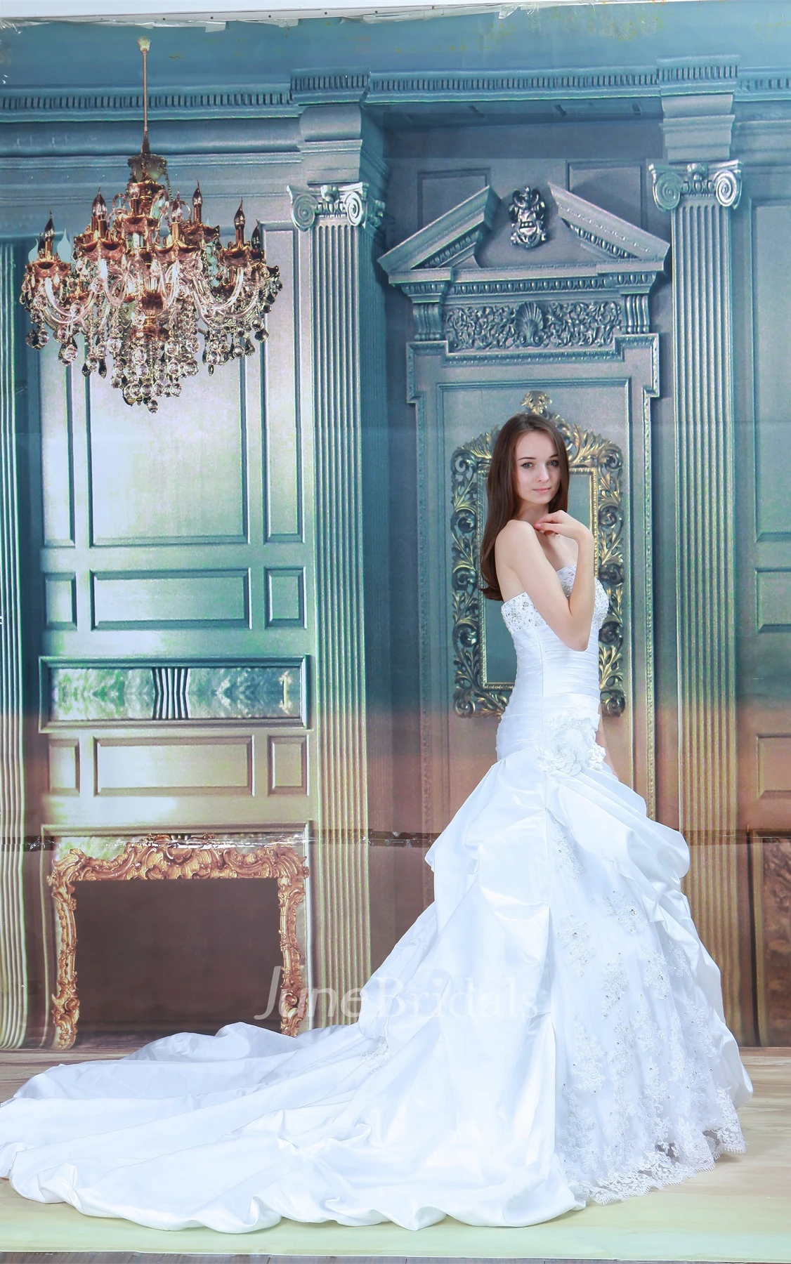 strapless a-line ball ruffled gown with appliques and beading