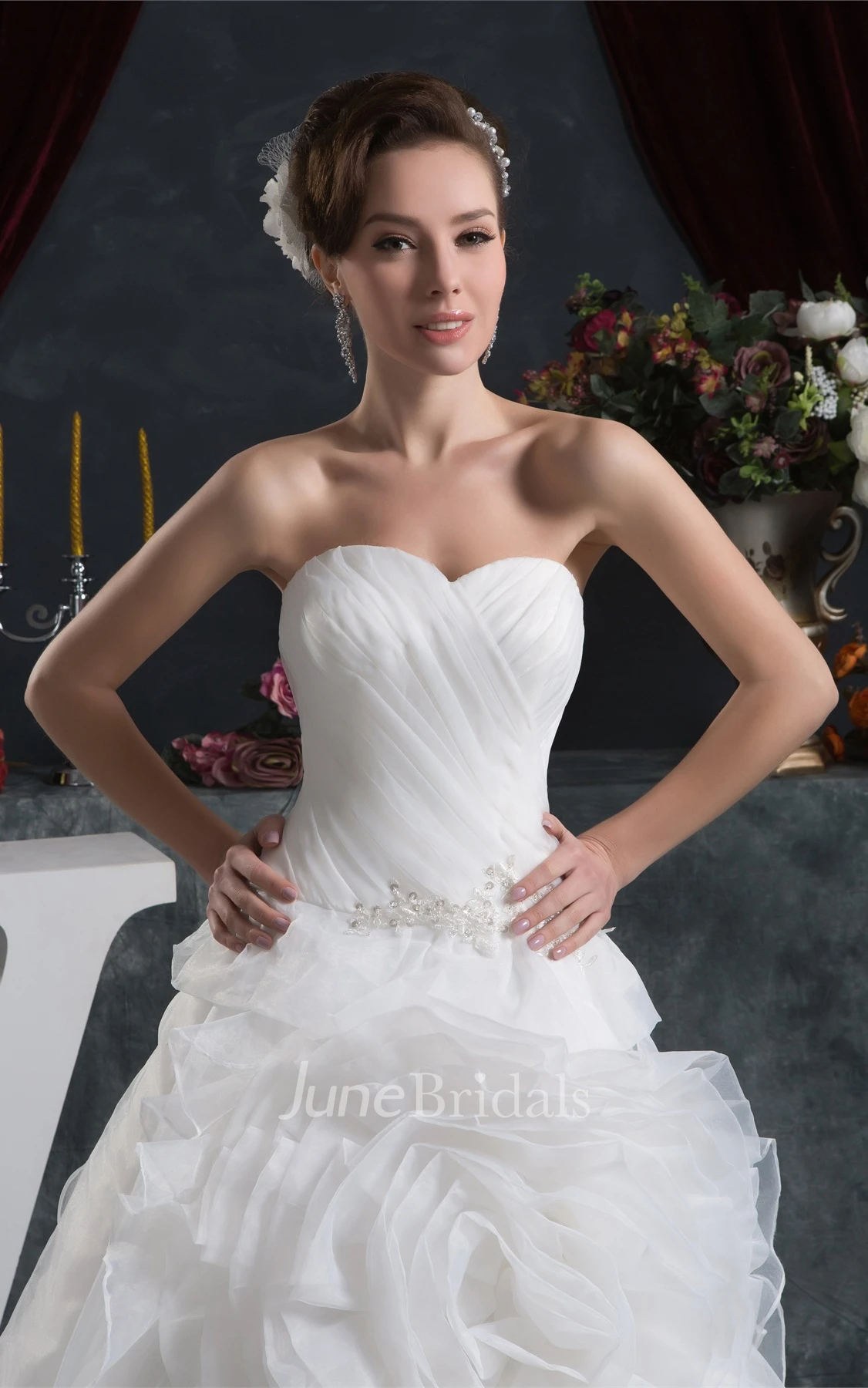 Sweetheart Criss-Cross Ball Gown with Ruffled Skirt and Stress