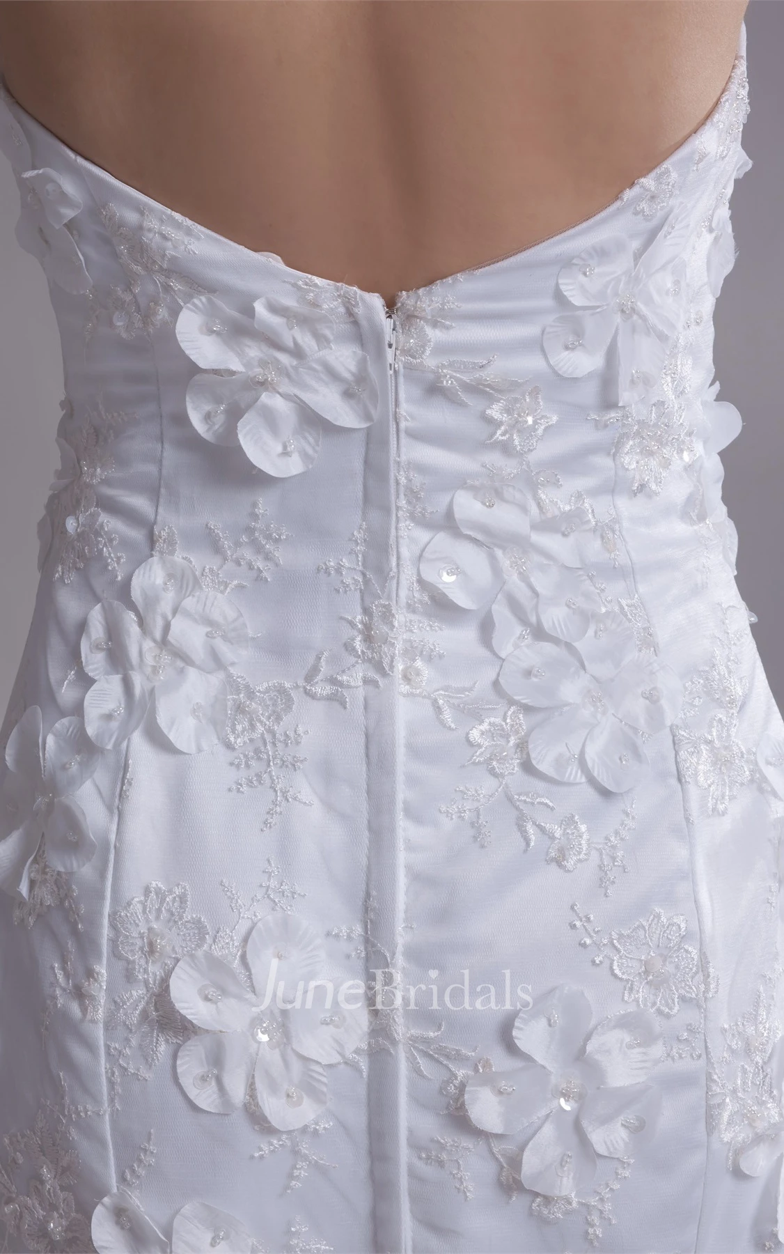 strapless lace mermaid dress with brush train and floral embellishment