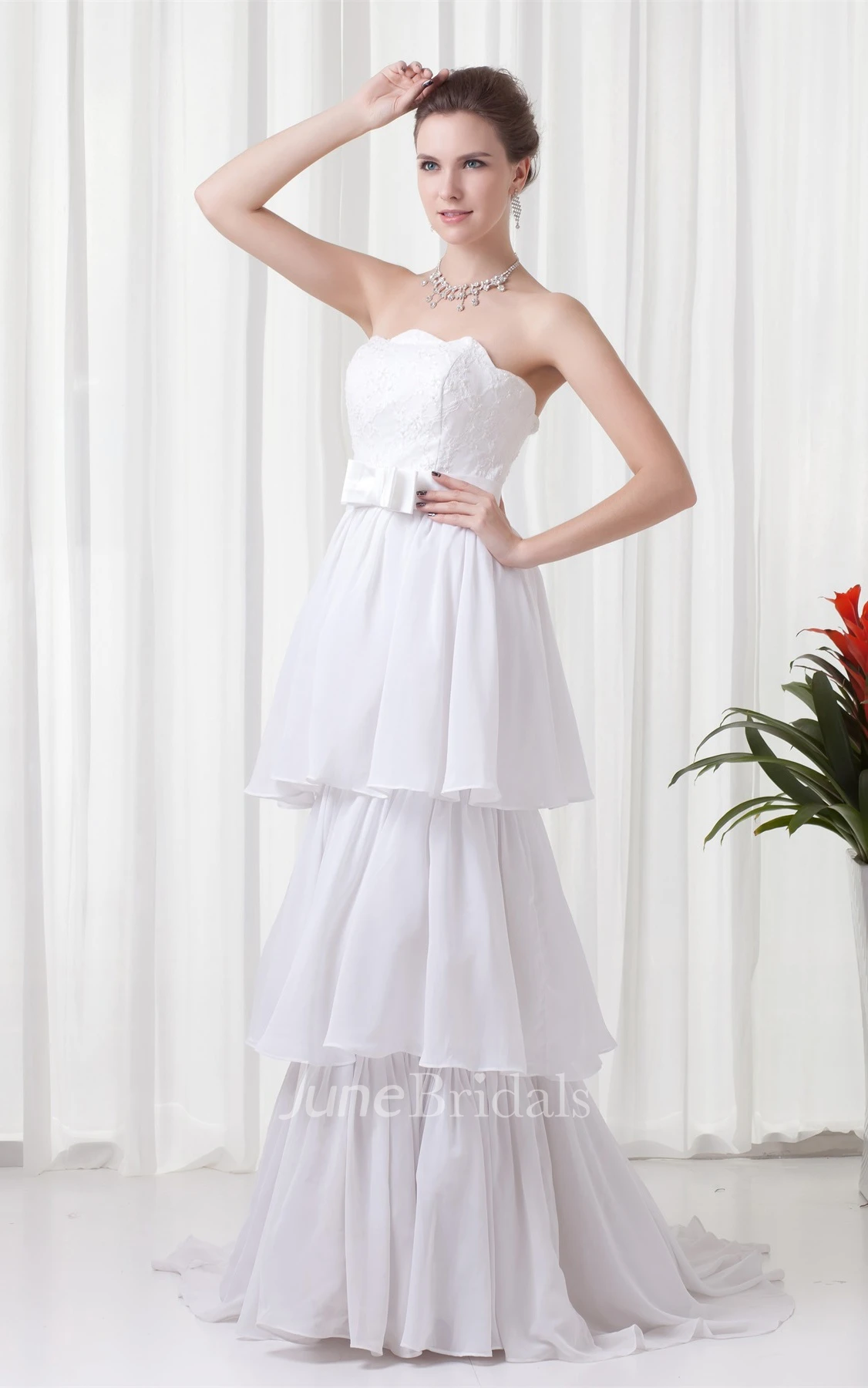 strapless tiered a-line dress with appliques and bow