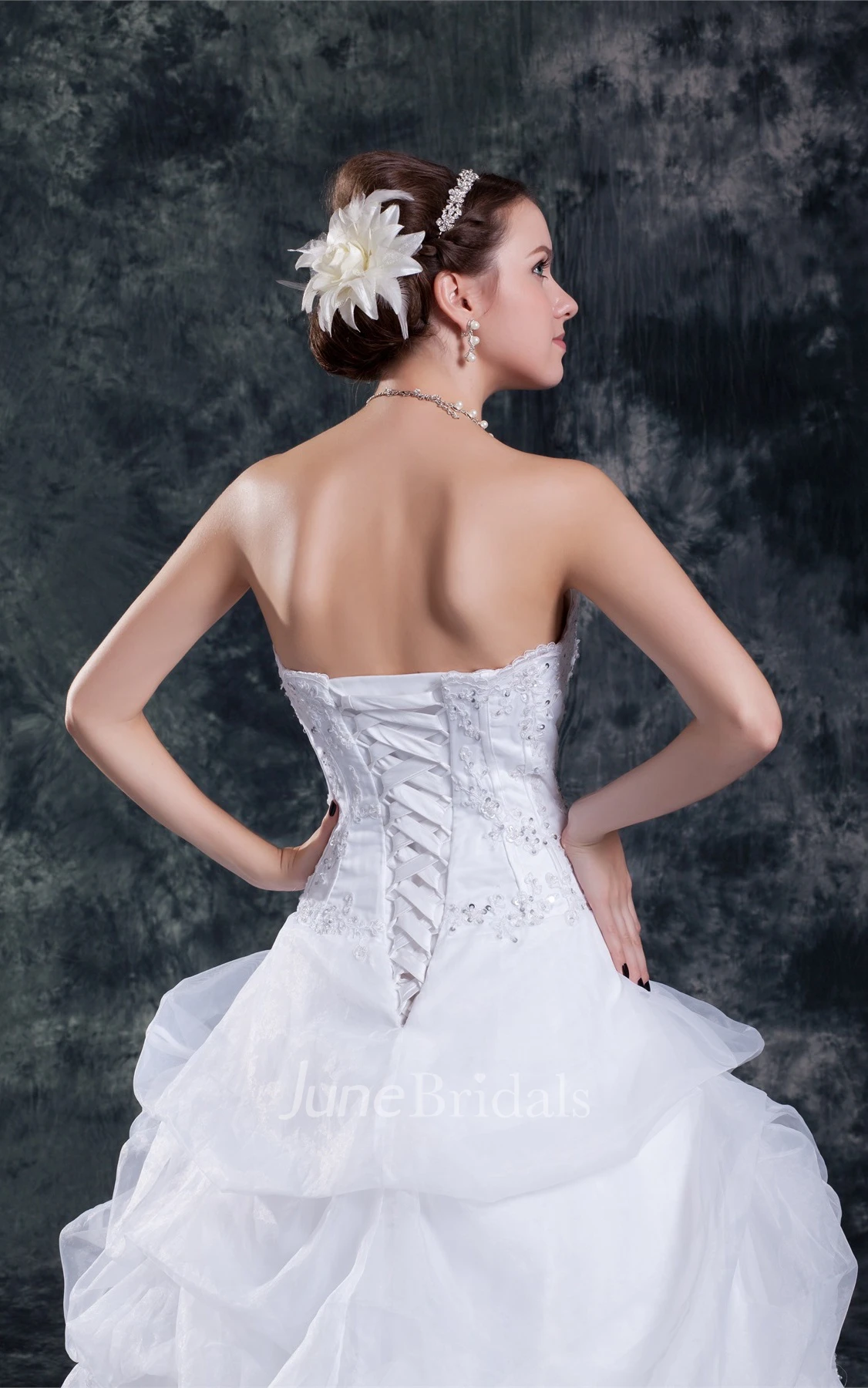 strapless a-line lace gown with beading and ruffles