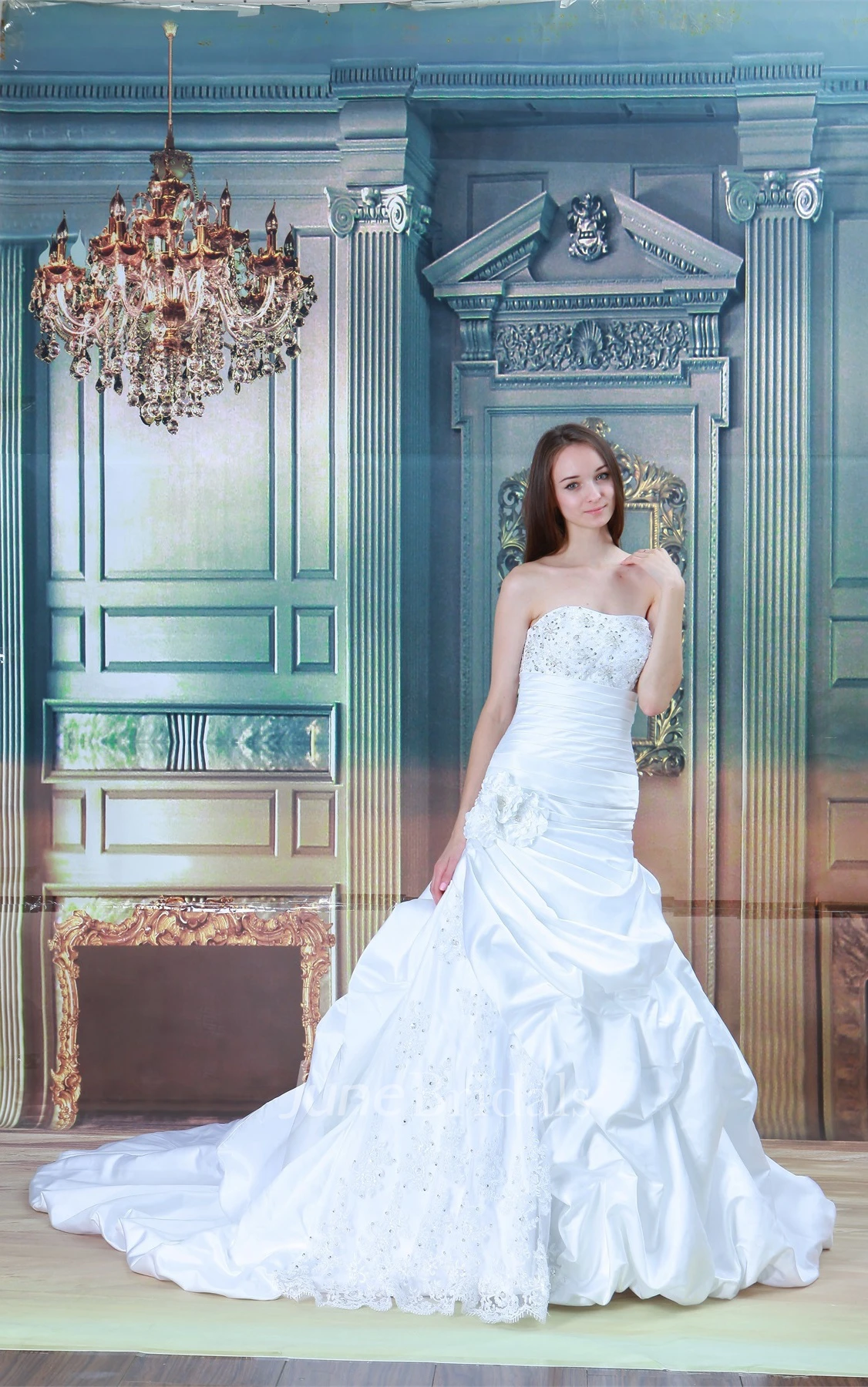 strapless a-line ball ruffled gown with appliques and beading