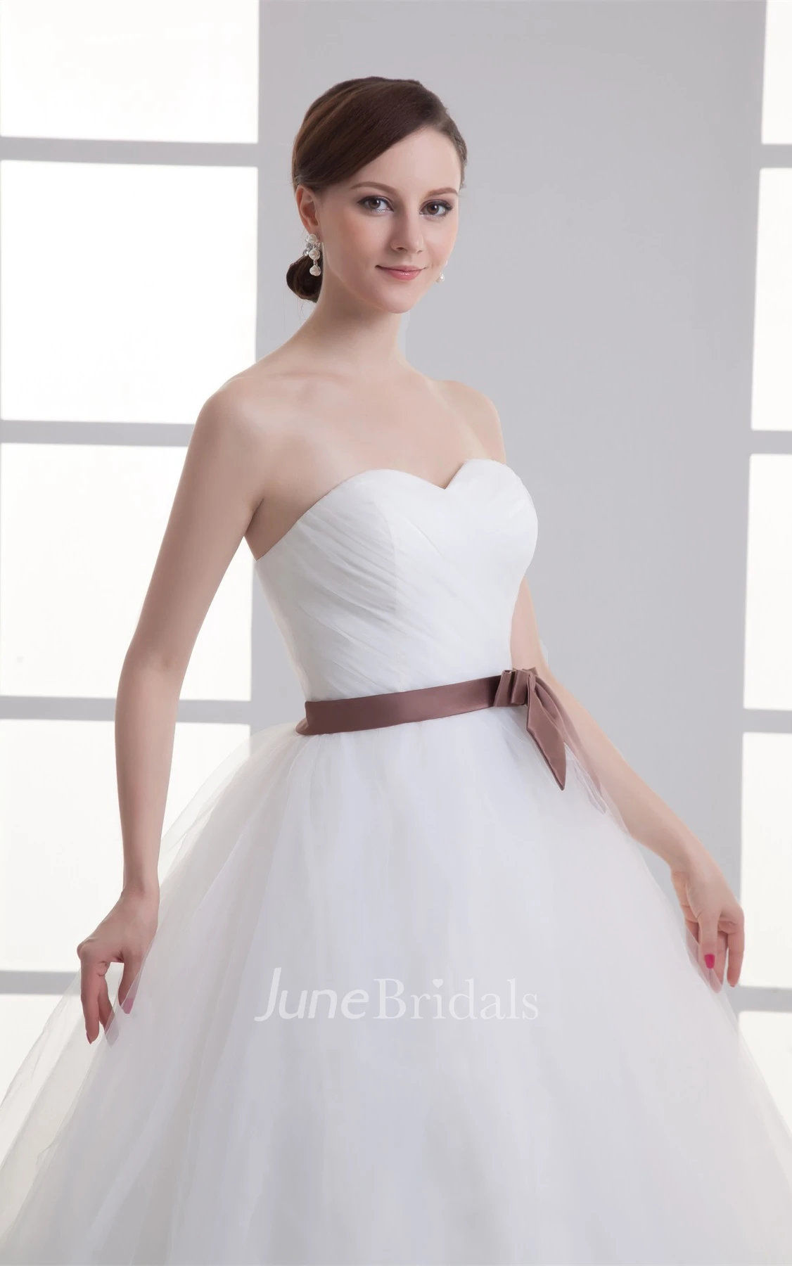 sweetheart criss-cross ball tulle gown with bow
