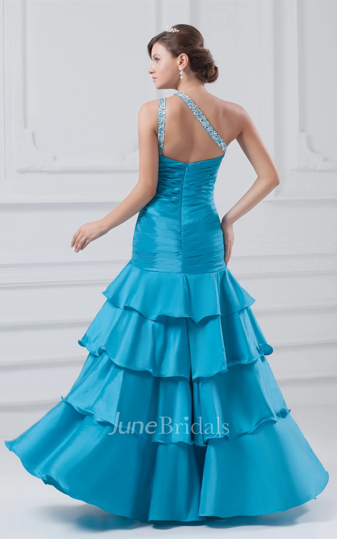 one-shoulder a-line ruched gown with tiers and beading