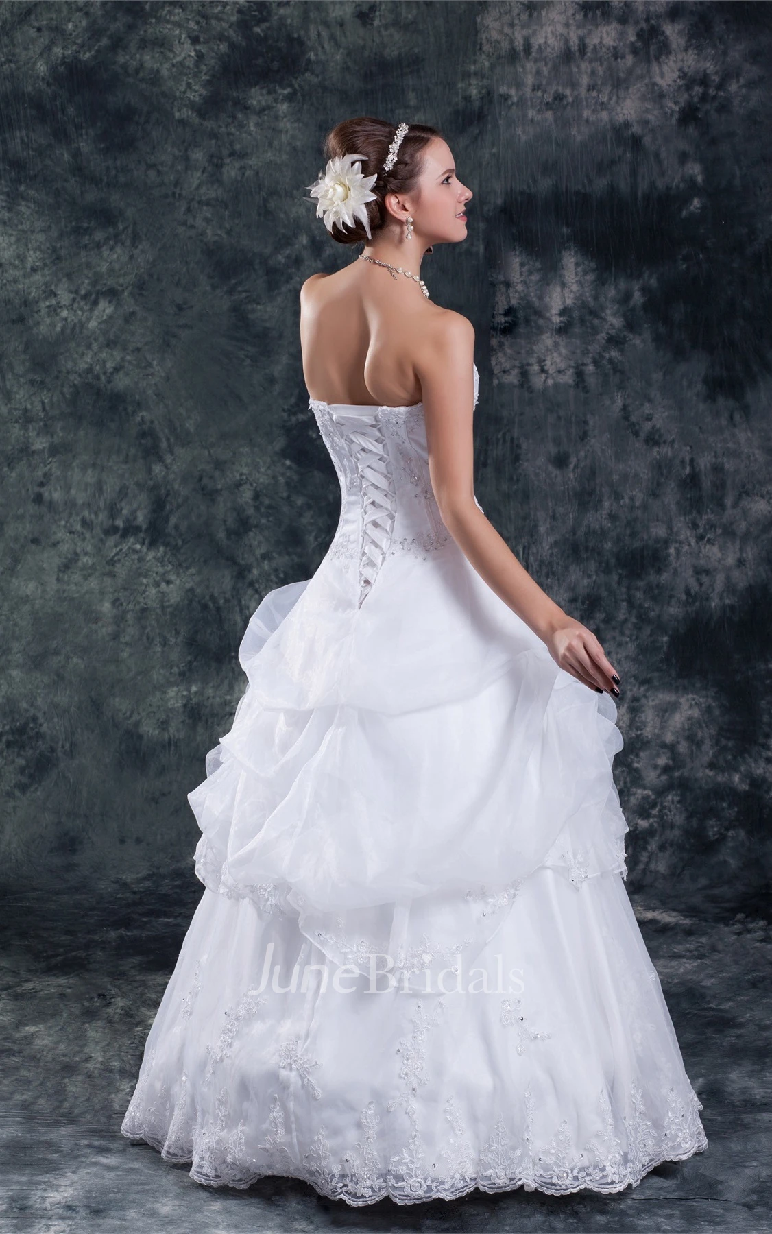 strapless a-line lace gown with beading and ruffles