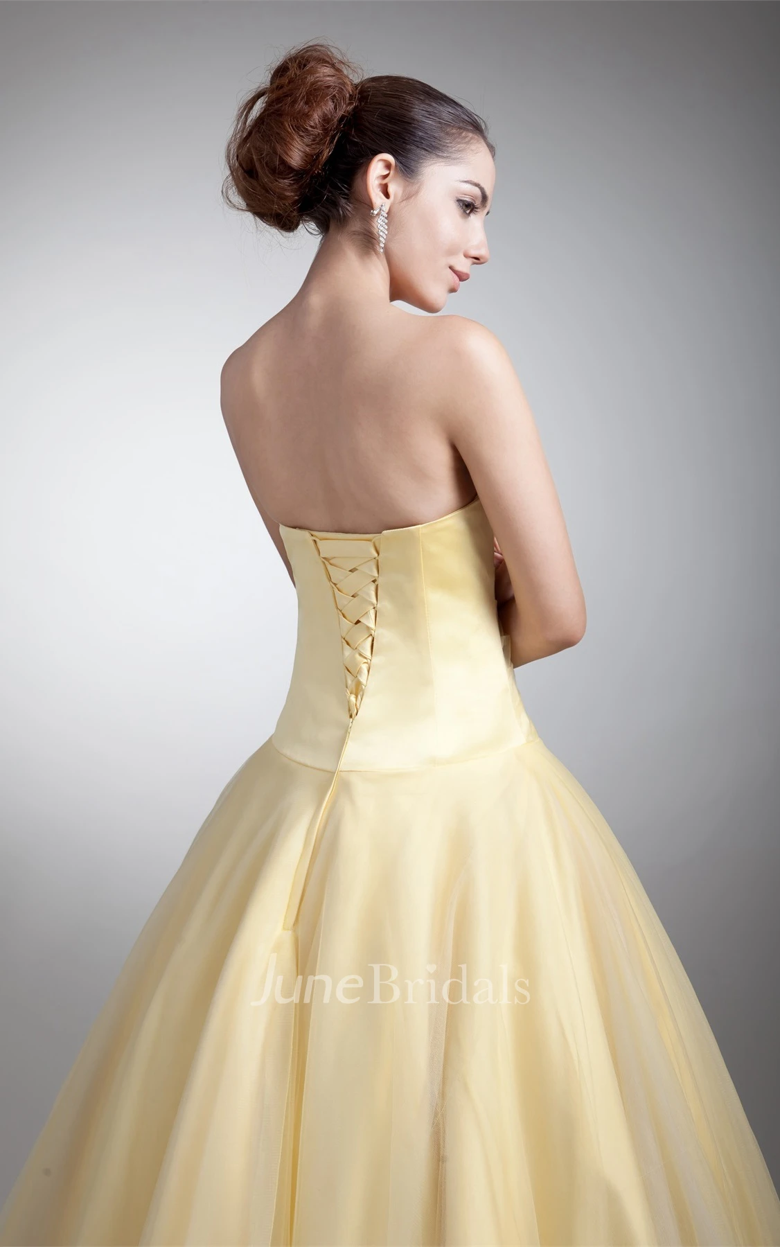 sweetheart a-line ball tulle gown with ruched waist and corset back
