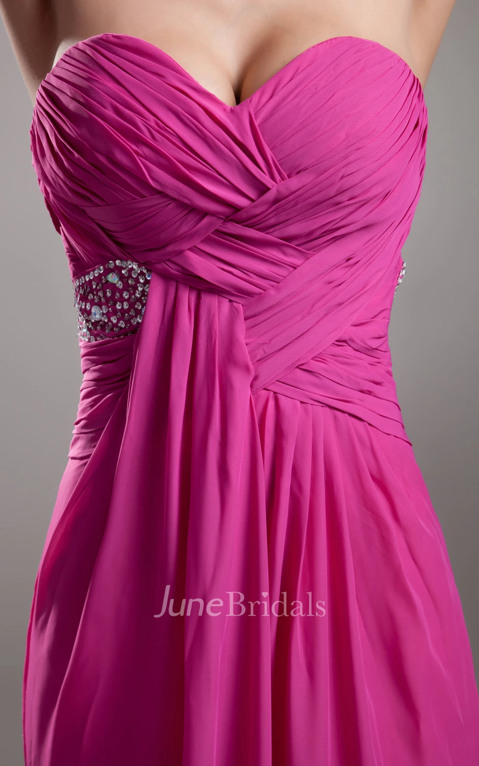 Soft Flowing Fabric Sweetheart Sleeveless Dress With Crystal Detailing And Draping