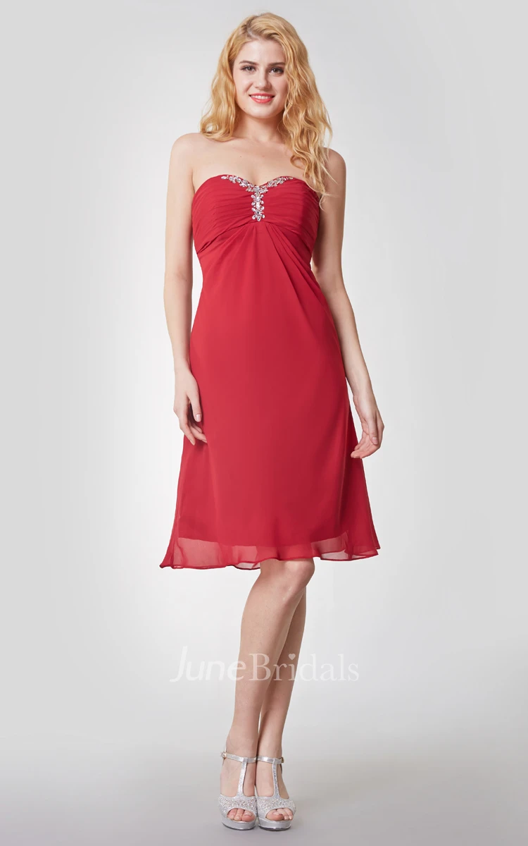 Sleeveless Empire Waist Knee Length Chiffon Dress With Beaded Detail