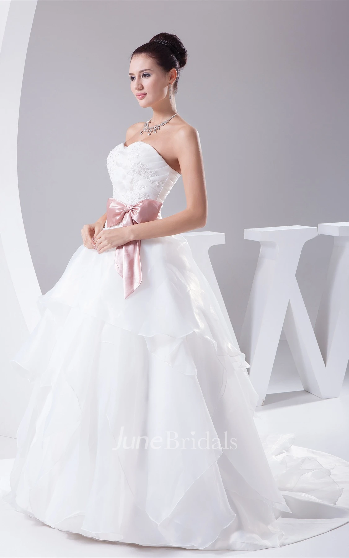 Sweetheart Ruffled Ball Gown with Ribbon and Appliques