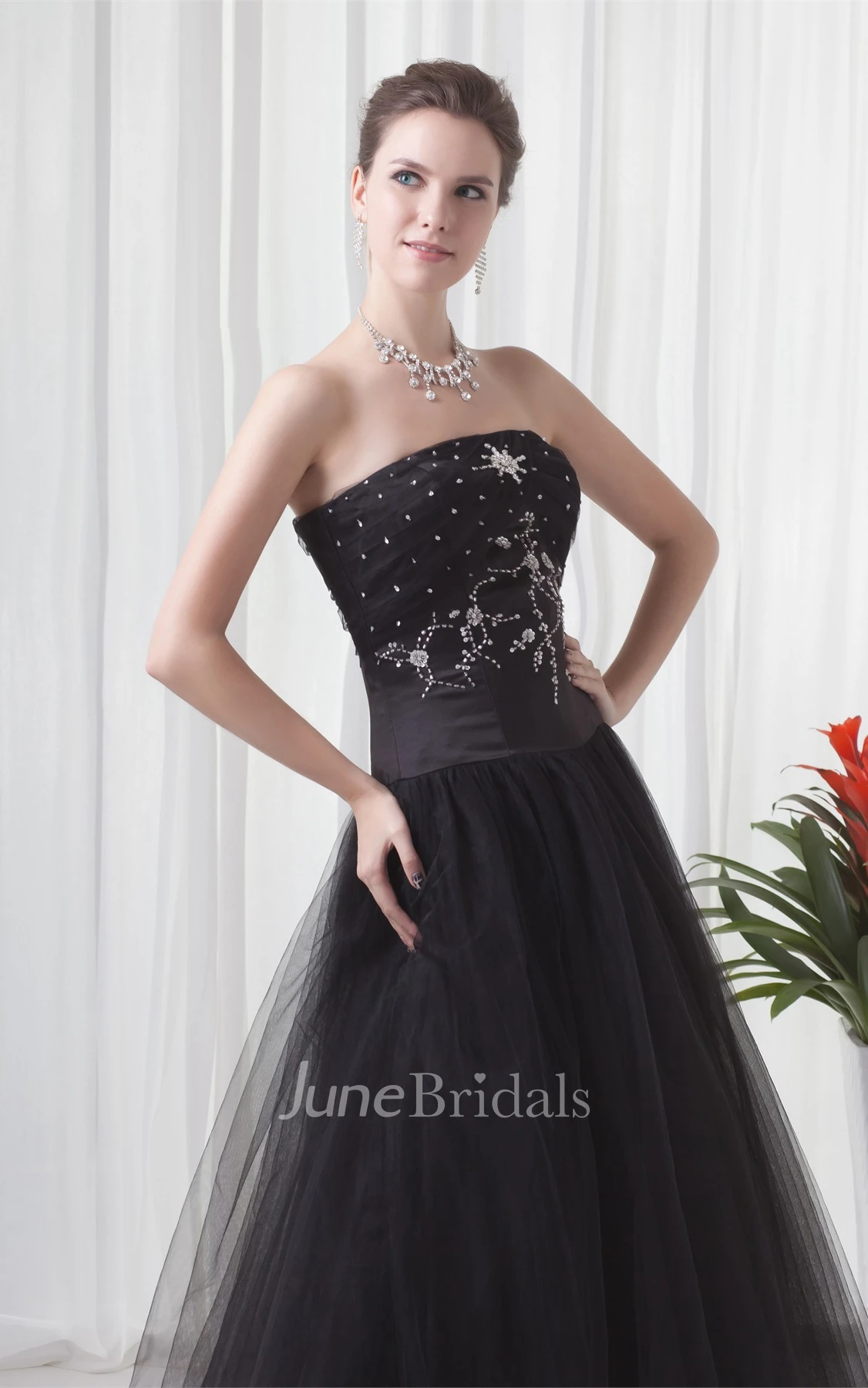 strapless ball a-line gown with tulle overlay and strass