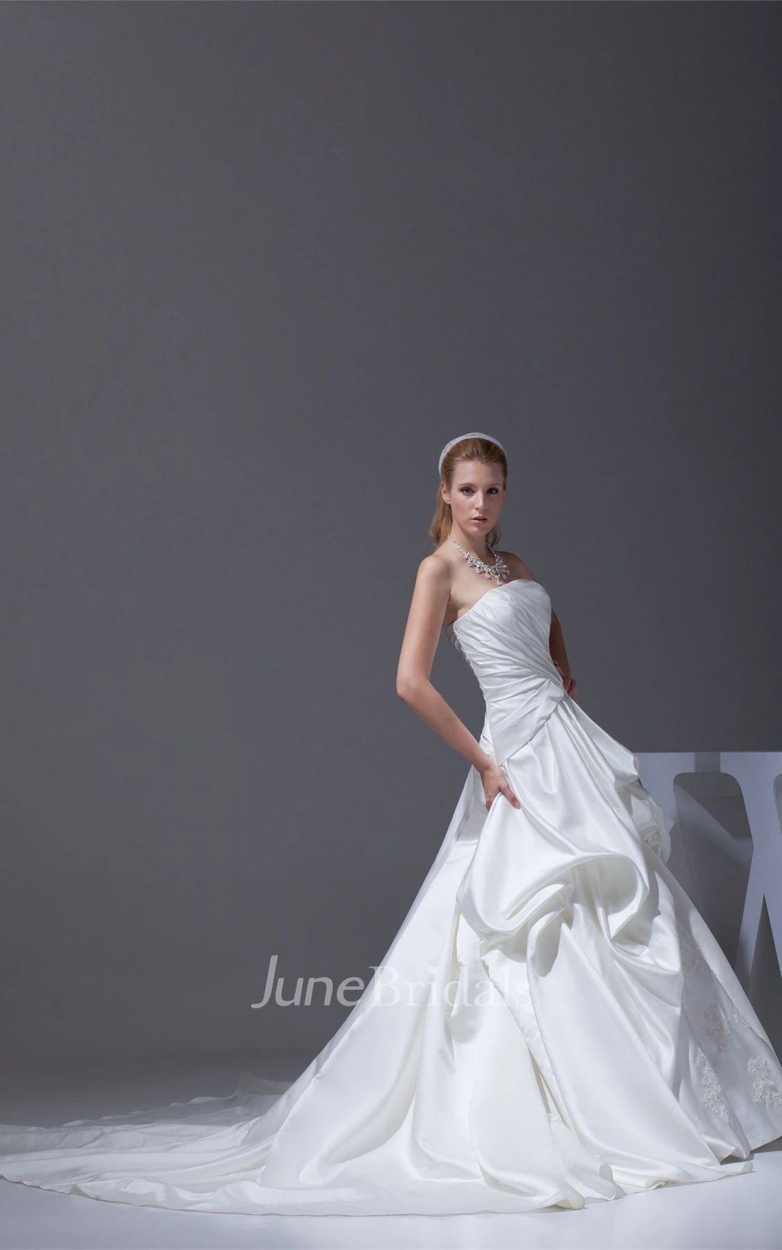 Ruched Criss-Cross Strapless Bodice Gown with Ruffles and Embellishment