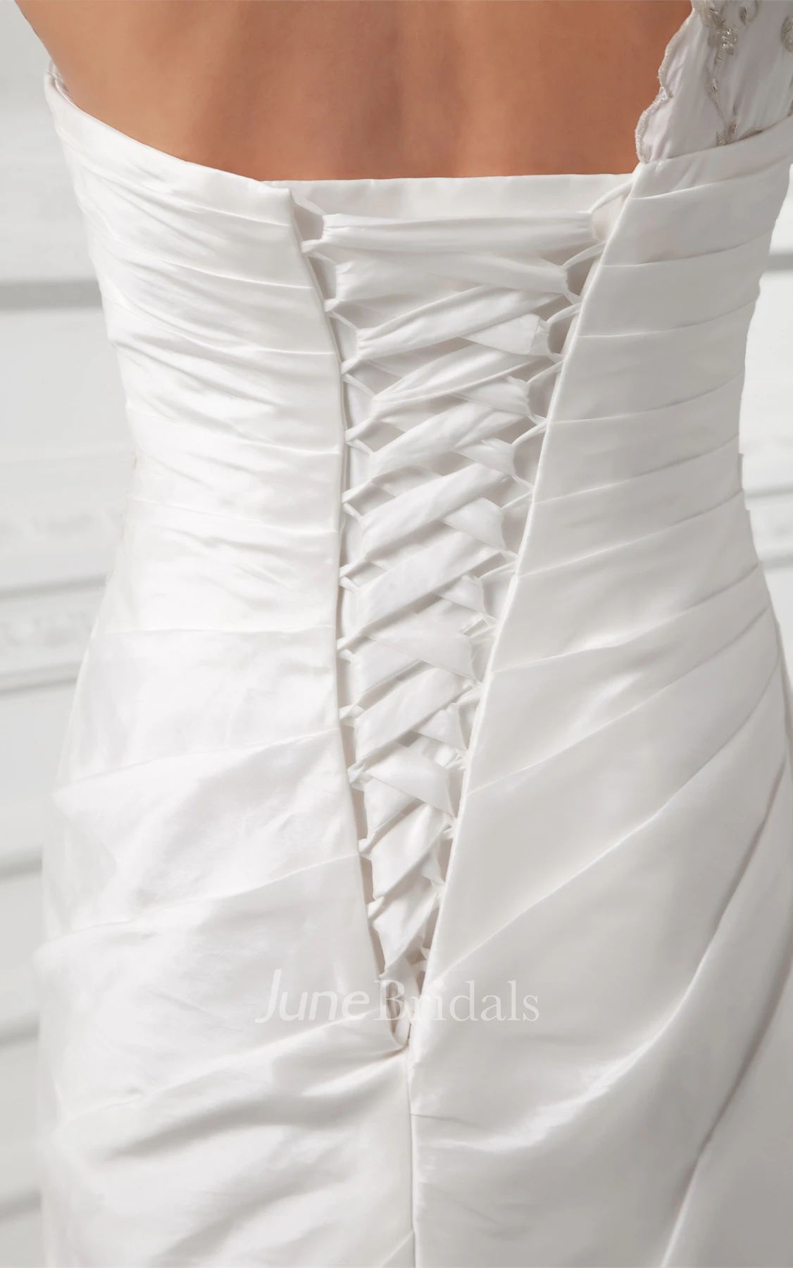 one-shoulder maxi mermaid gown with corset back and appliques