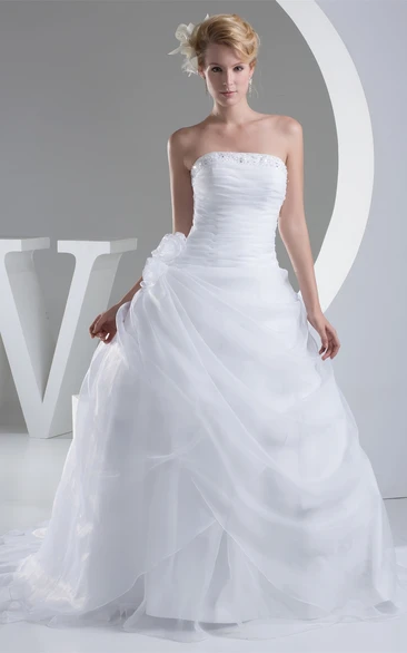 Strapless Ruched Jeweled Ball Gown with Flower and Ruffles