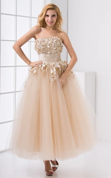 strapless ankle-length tulle dress with appliques and flower