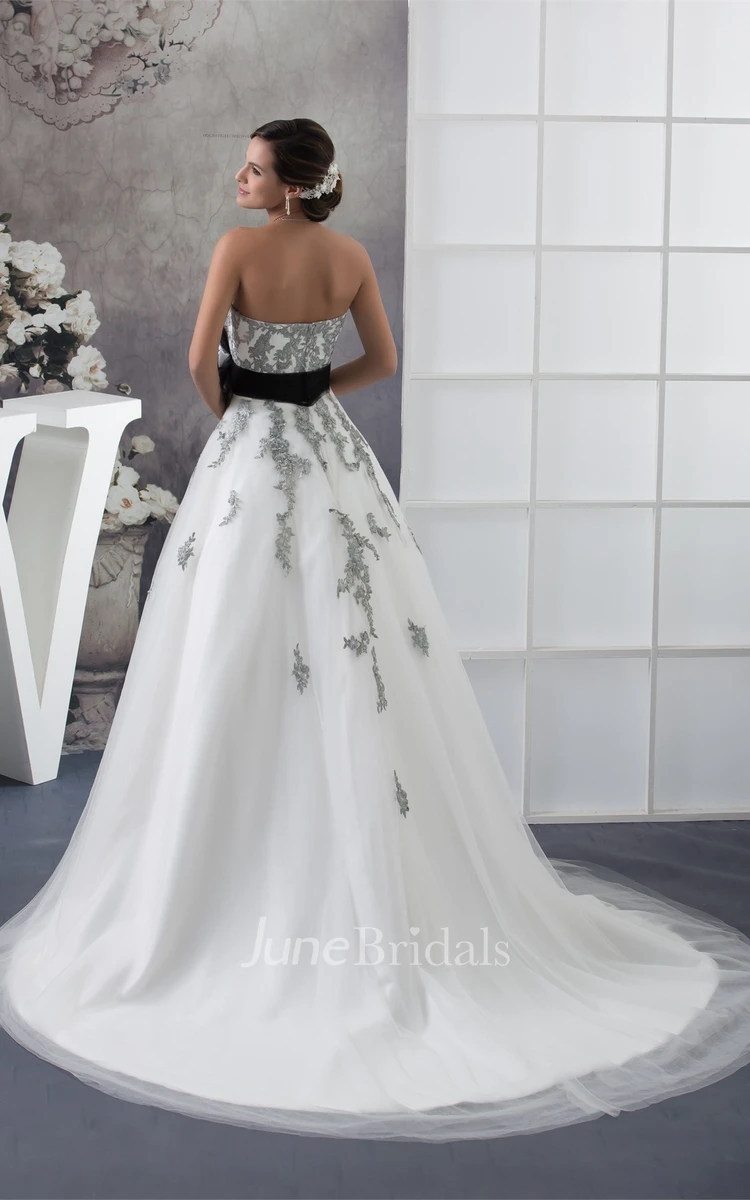Strapless Appliqued Ball Gown with Flower and Tulle Overlay