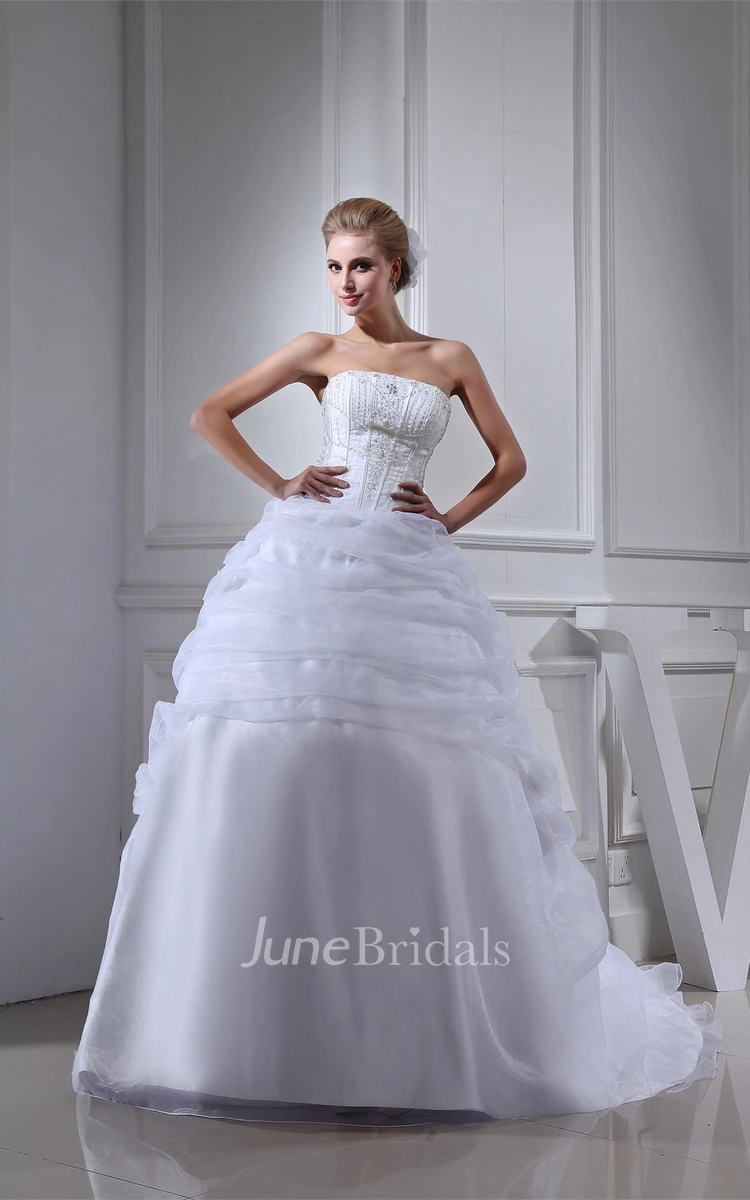 Strapless Ruffled Tulle Ball Gown with Flower and Gemmed Bodice