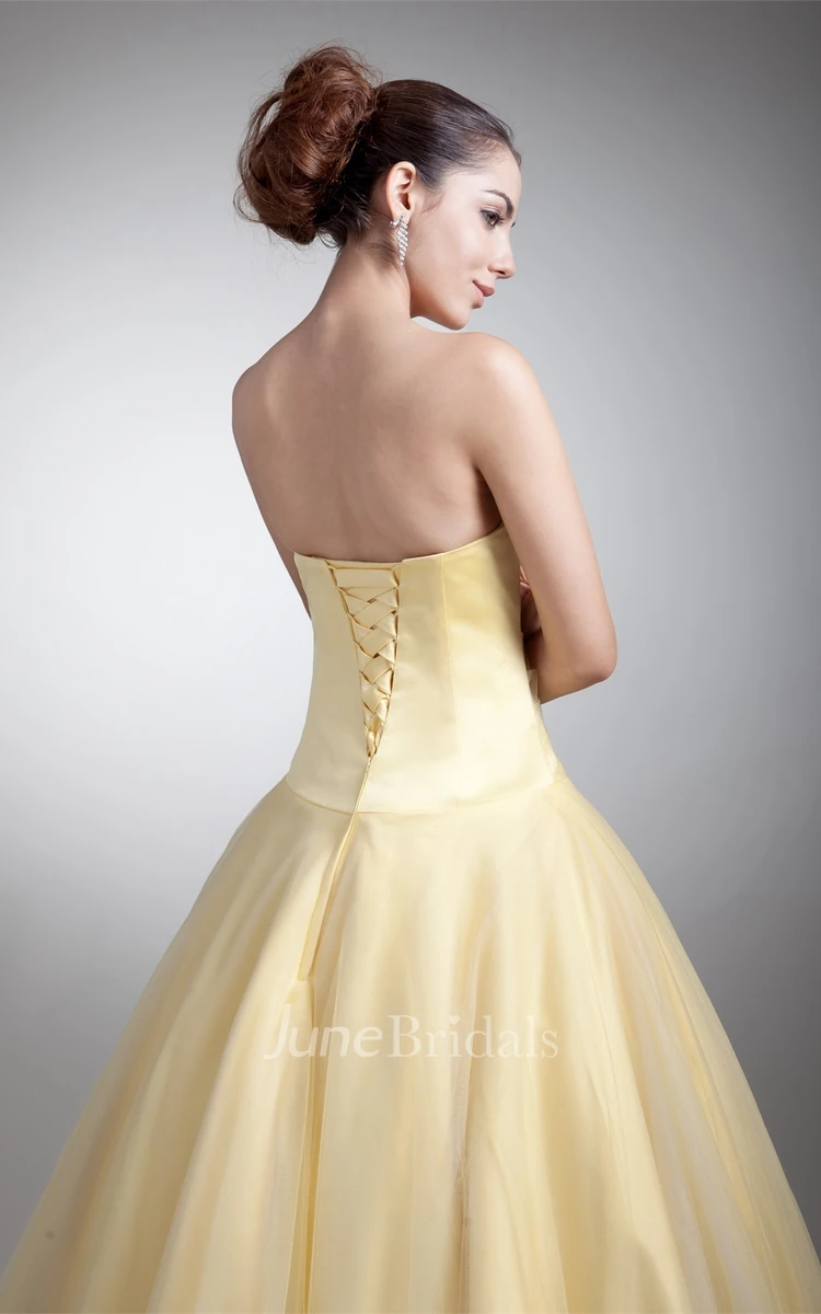 sweetheart a-line ball tulle gown with ruched waist and corset back
