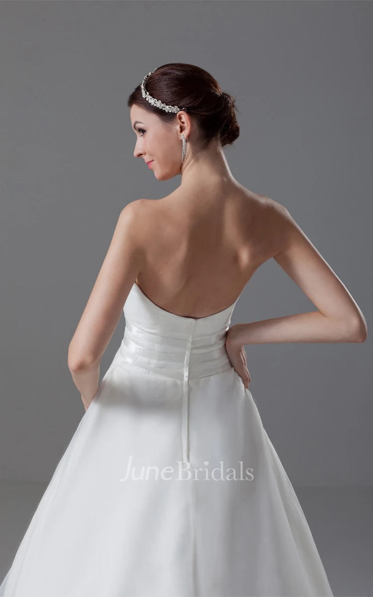 strapless ball a-line gown with backless design and court train