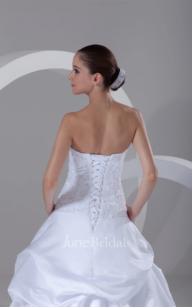 strapless ball pick-up gown with corset back and appliques