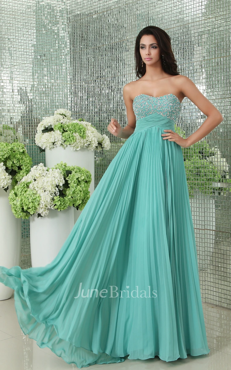 Pleated Empire Soft Flowing Fabric Gown With Sequined Bodice