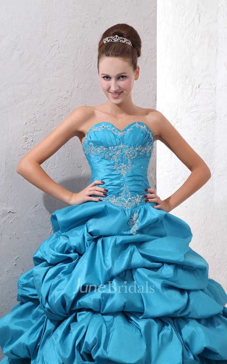 Sweetheart Sleeveless Princess Ball Gown With Crystal Detailing And Pick-Up Ruffles