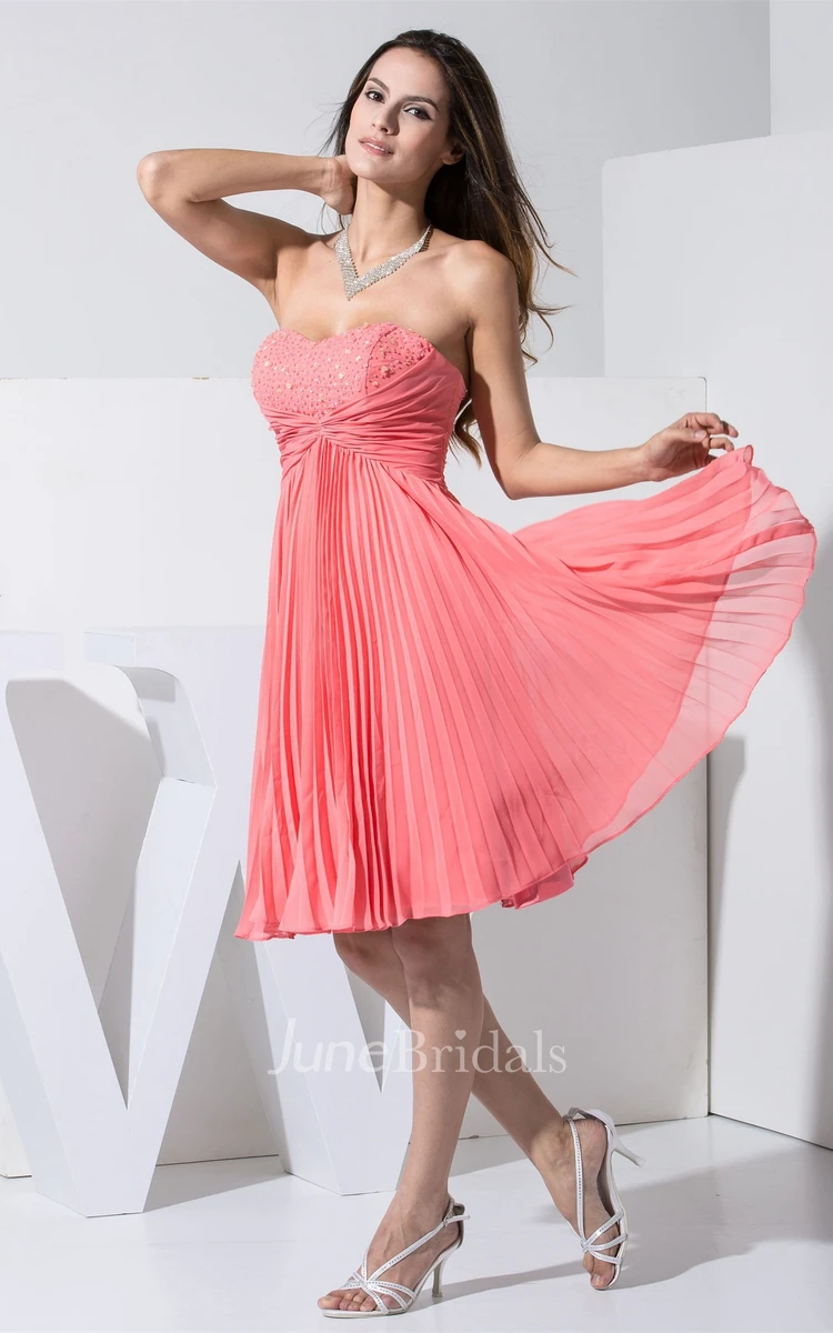 Lovely Sweetheart Knee-Length Beaded Gown with Ruching and Pleats