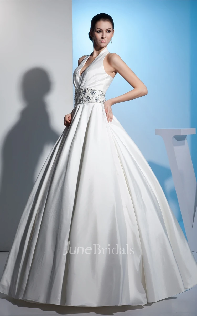 Plunged Sleeveless Ball Gown with Central Ruching and Gemmed Waist