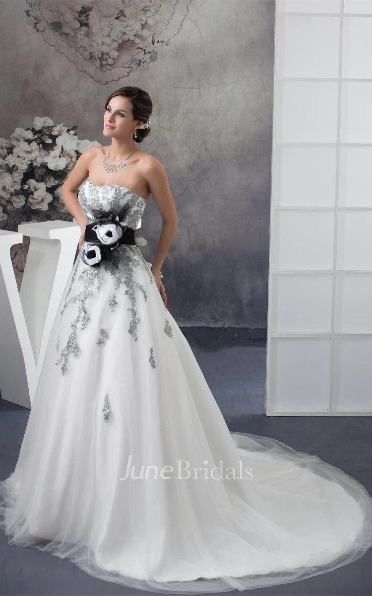 Strapless Appliqued Ball Gown with Flower and Tulle Overlay