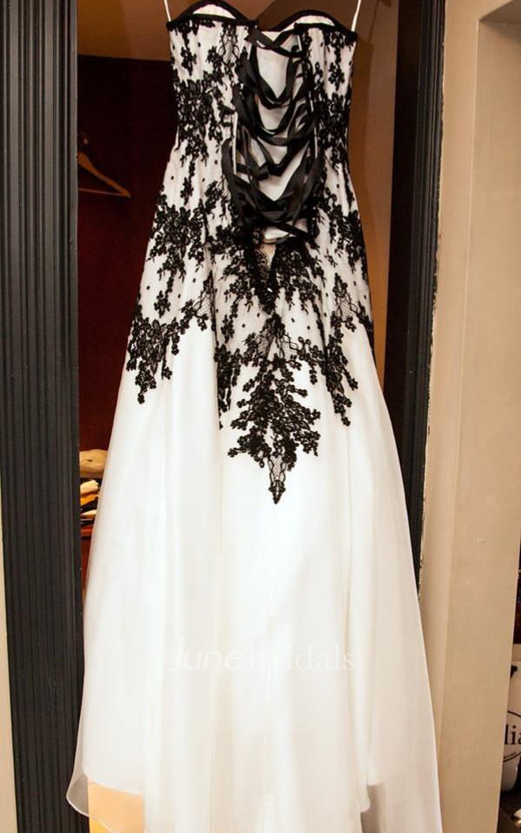 White gown with outlet black lace